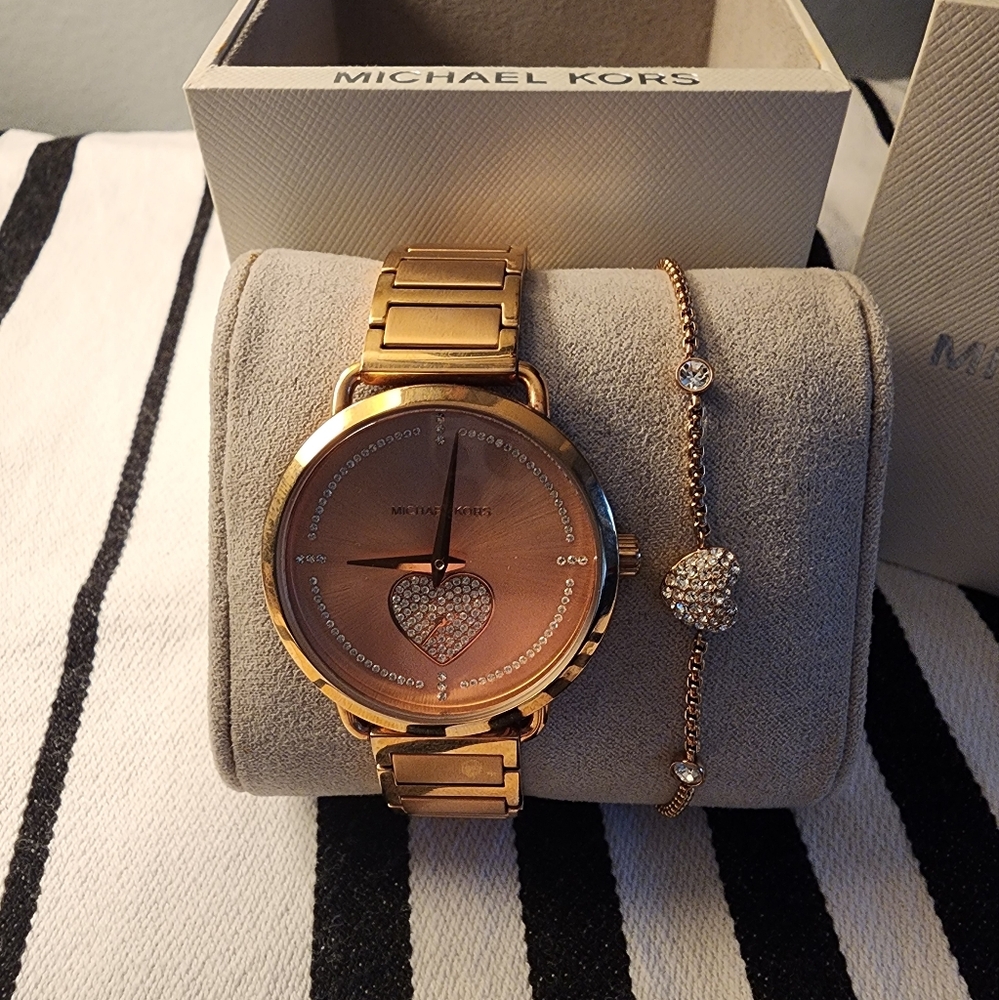 Michael kors rose gold watch with matching bracelet